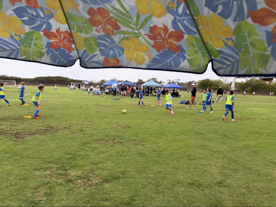 San Diego Allen Field youth game in progress with rain